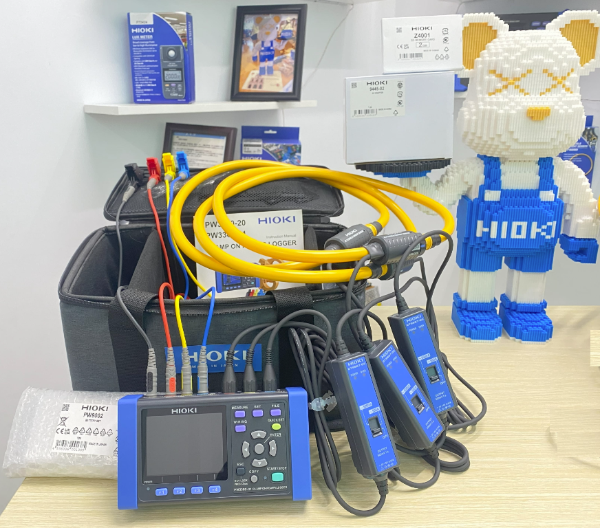 A group of electrical equipment on a table AI-generated content may be incorrect.